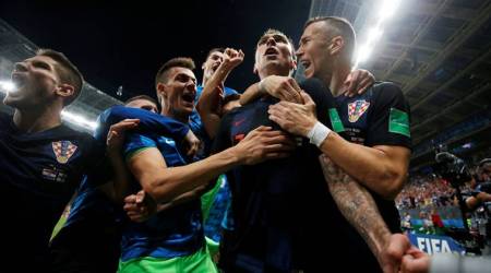 Soccer Football - World Cup - Semi Final - Croatia v England - Luzhniki Stadium, Moscow, Russia - July 11, 2018  Croatia's Mario Mandzukic celebrates scoring their second goal with teammates  REUTERS/Carl Recine