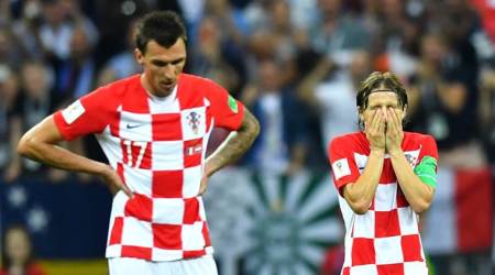 Croatia's Luka Modric and Mario Mandzukic react