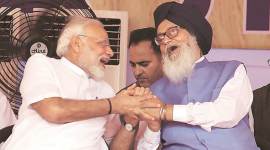 Prime Minister Narendra Modi with former Punjab CM and SAD leader Parkash Singh Badal in Muktsar on Wednesday. (Photo: Gurmeet Singh)