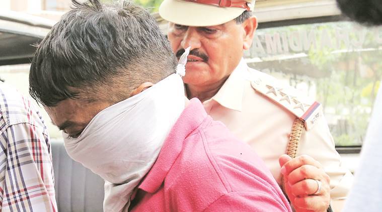 Accused Sahab Singh being produced in Panchkula court on Sunday. (Express photo/Kamleshwar Singh)