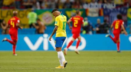 Brazil's Neymar reacts after Belgium's Kevin De Bruyne scored his side's second goal during the quarterfinal match between Brazil and Belgium at the 2018 soccer World Cup in the Kazan Arena, in Kazan, Russia, Friday, July 6, 2018. (AP Photo/Eduardo Verdugo)