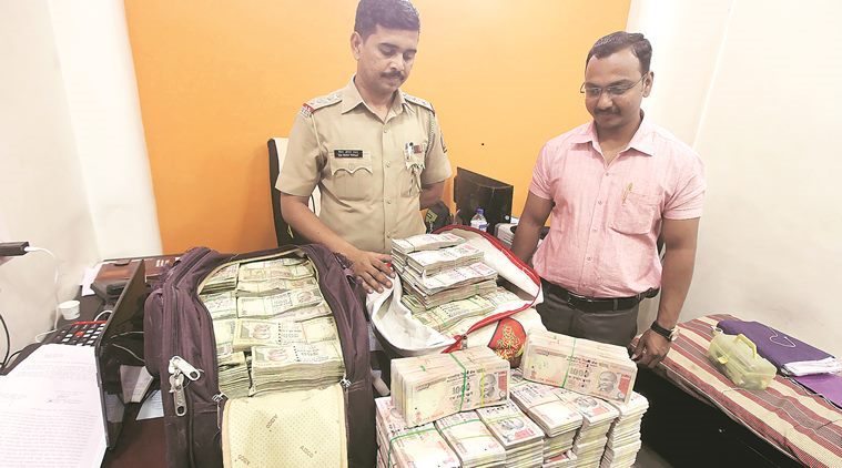 The old currency seized from the suspects. (Express photo/Pavan Khengre)