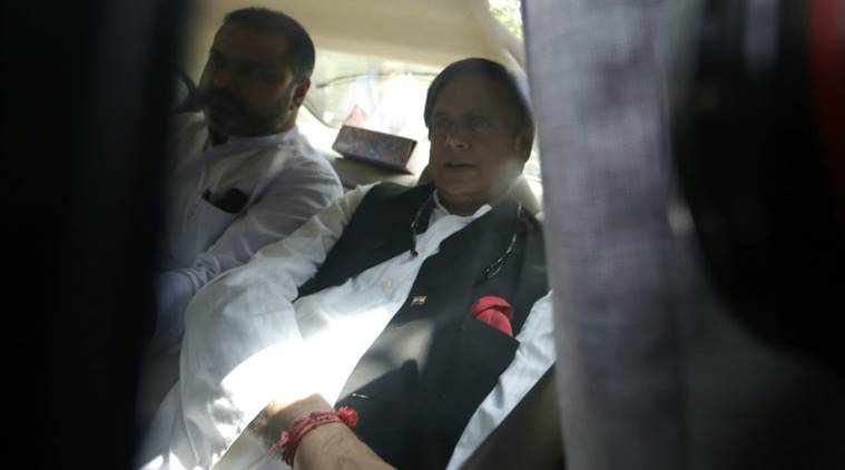 Congress MP Shashi Tharoor outside Delhi's Patiala House Court on Saturday. (Express photo/Praveen Khanna)