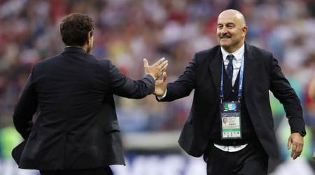 Soccer Football - World Cup - Round of 16 - Spain vs Russia - Luzhniki Stadium, Moscow, Russia - July 1, 2018  Russia coach Stanislav Cherchesov shakes hands with Spain coach Fernando Hierro at the end of the match   REUTERS/Carl Recine