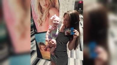 Model breastfeeds baby Runway, woman breastfeeds on runway, mara martin, sports model, swim suit model, viral news, trending, indian express, indian express news