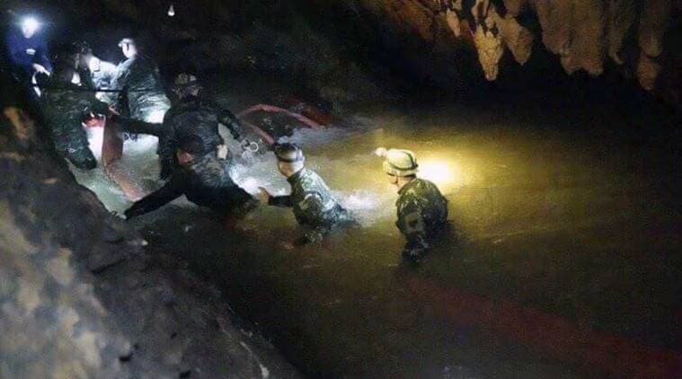 Thailand rescue teams find 13 missing in cave with 'signs of life'