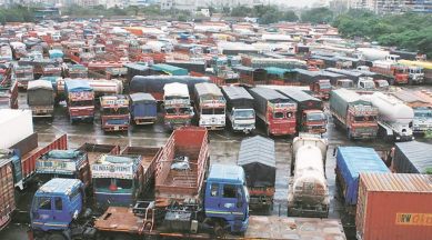Trucks remain grounded at the Vashi APMC terminal in Navi Mumbai on Friday. (Express photo/Amit Chakravarty)