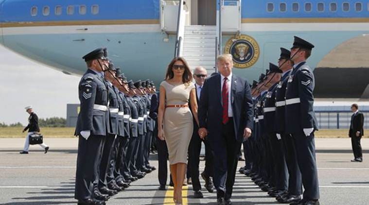 US President Trump and First Lady Melania Trump being welcomed at the airport. (AP)