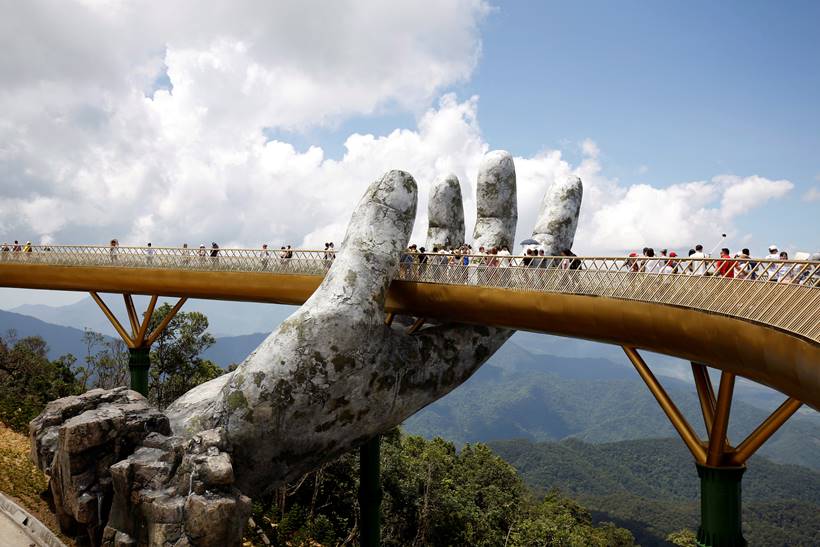In the hands of the gods: Vietnam's Golden Bridge has giant support