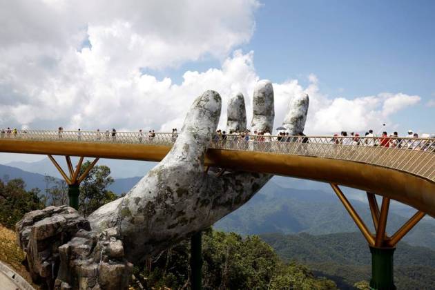 In the hands of the gods: Vietnam's Golden Bridge has giant support