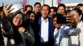 Cambodia, Cambodia elections, Cambodia Prime Minister, Prime Minister Hun Sen, Hun Sen takes selfies, Hun Sen inaugurates boat terminal, World News, Indian Express