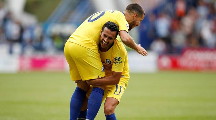 Chelsea's Pedro celebrates scoring their third goal with Eden Hazard