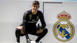 Real Madrid soccer player Thibaut Courtois poses for the media during his official presentation for Real Madrid at the Santiago Bernabeu stadium in Madrid