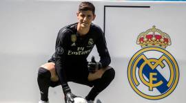 Real Madrid soccer player Thibaut Courtois poses for the media during his official presentation for Real Madrid at the Santiago Bernabeu stadium in Madrid