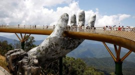 In the hands of the gods: Vietnam's Golden Bridge has giant support