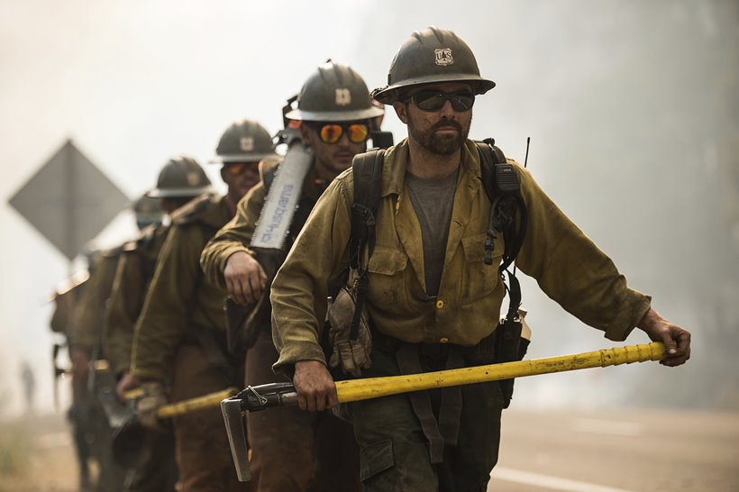 California's largest wildfire surges as temperature rises