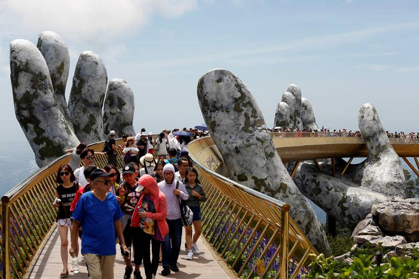 In the hands of the gods: Vietnam's Golden Bridge has giant support