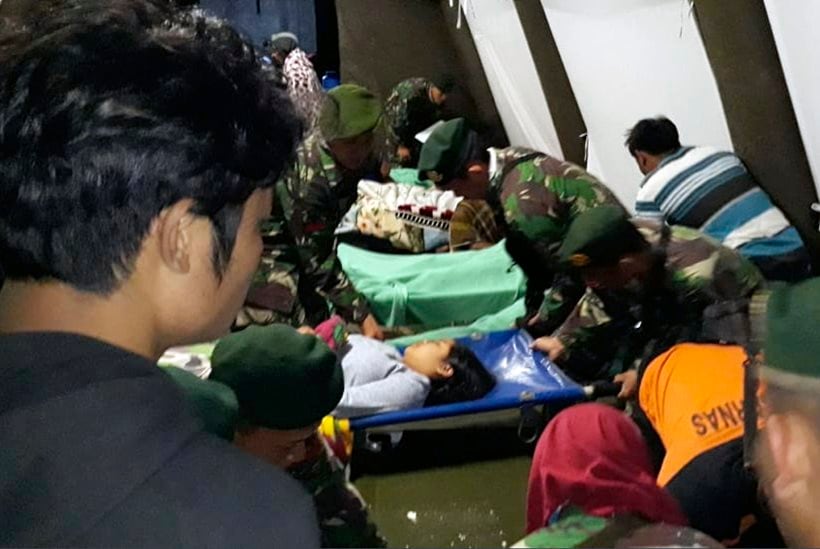 Thousands flee homes as powerful earthquake kills at least 82 on Indonesia's Lombok