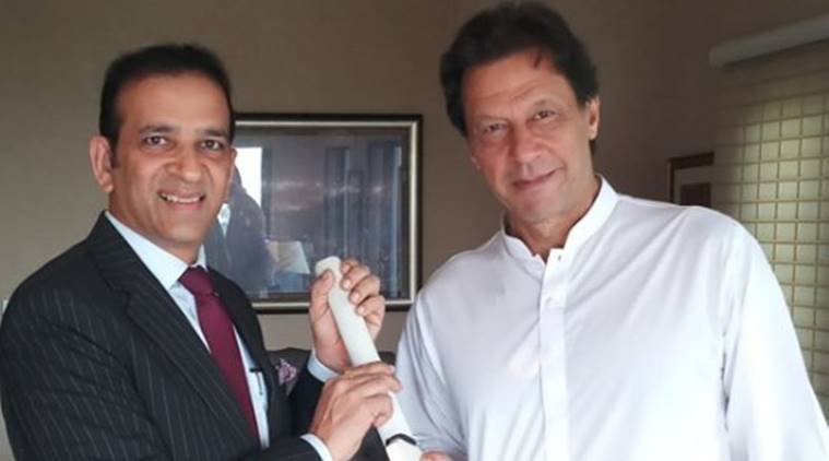 Imran Khan (R) presented with a bat by Indian High Commissioner to Pakistan Ajay Bisaria. (Source: ANI)