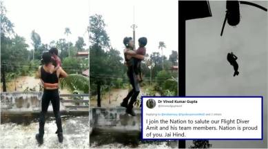 kerala, kerala floods, kerala rescue operation, operation madad, navy kerala rescue, kerala rescue videos, navy man saves child, kerala air-lift videos, viral videos, indian express