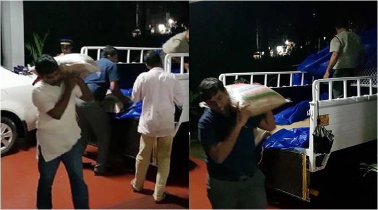 Kerala Floods Netizens Laud Ias Officers Carrying Rice Sacks At Relief