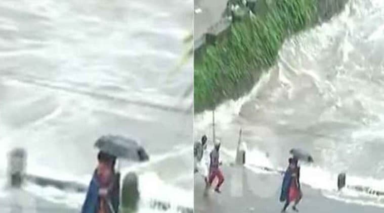 WATCH Video | Kerala rains: NDRF man runs across flooding bridge with ...