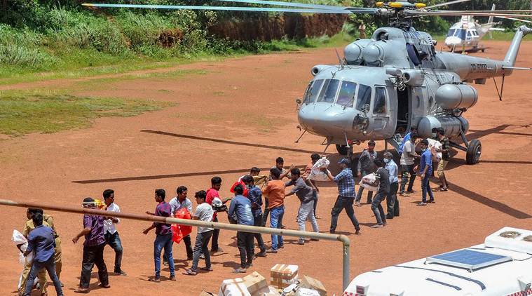 Indian Navy supplies Food and materials to the flood affected people of Chengannur on Wednesday. (PTI)