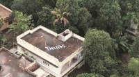 A message of ‘thanks’ on the rooftop of a house from where two women were rescued in Kochi on Sunday.