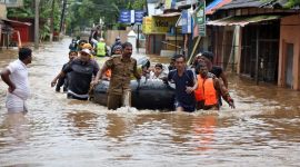 The ground floor of most houses along the Pandanad-Parumala road in Karuvelil village, and the cars parked outside them, were found under 6-7 ft water. (Reuters)