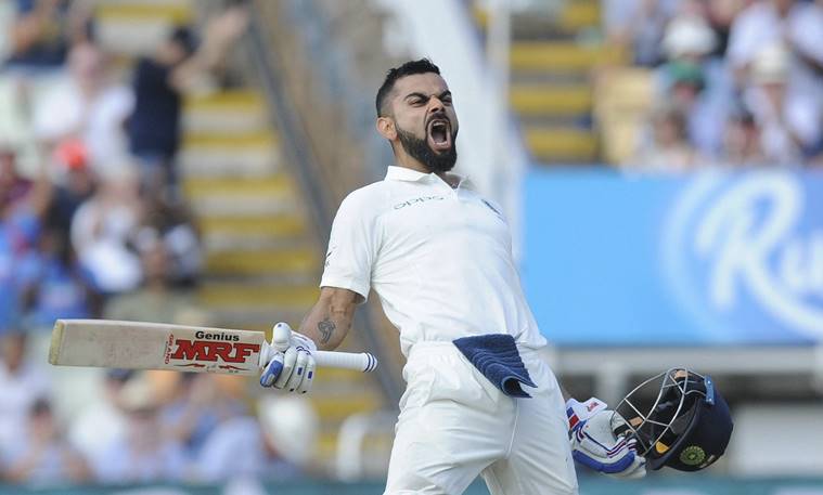Indian cricket captain Virat Kohli celebrates after scoring a century during the second day of the first test cricket match between England and India at Edgbaston in Birmingham