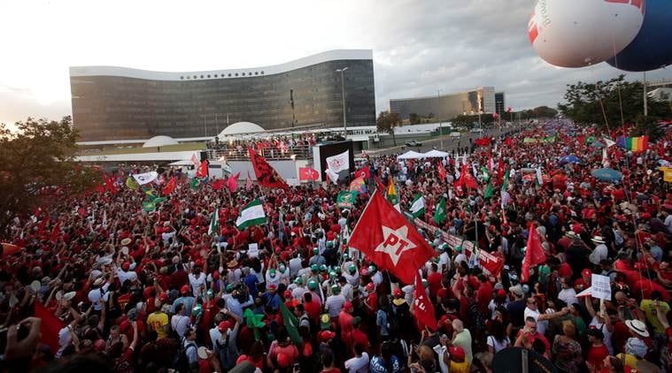 Former president Lula da Silva registers for Brazil elections from jail as thousands rally