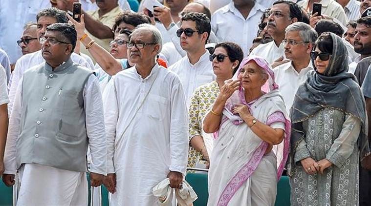 Union Law Minister Ravi Shankar Prasad (L), former Jammu and Kashmir Chief Minister Mehbooba Mufti (R) and other dignitaries during former prime minister Atal Bihari Vajpayee's cremation with full state honour, at Rashtriya Smriti Sthal in New Delhi on Friday. (PTI)