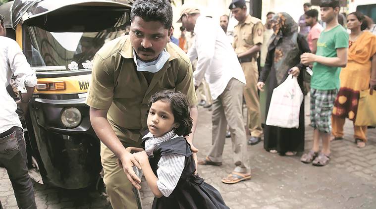 Mumbai school poisoning: Panic in Baiganwadi, police step in to control angry parents