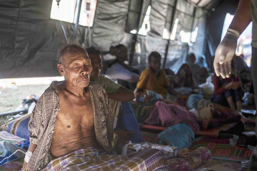 Quake puts life on hold in damaged Indonesia's Lombok island, over 100 dead