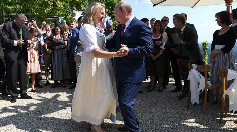 Vladimir Putin dances at Austria wedding before meeting