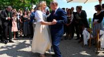 Vladimir Putin dances at Austria wedding before meeting Angela Merkel