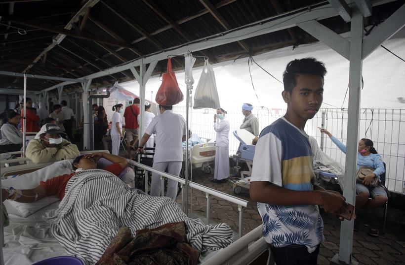 Thousands flee homes as powerful earthquake kills at least 82 on Indonesia's Lombok