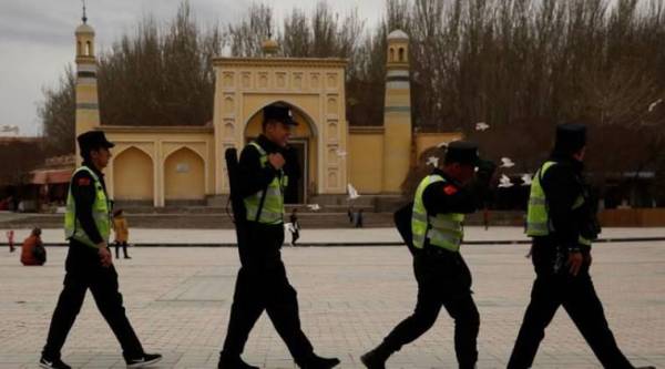 China has prevented 'great tragedy' in Xinjiang, state-run paper says