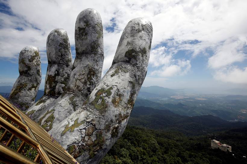In the hands of the gods: Vietnam's Golden Bridge has giant support