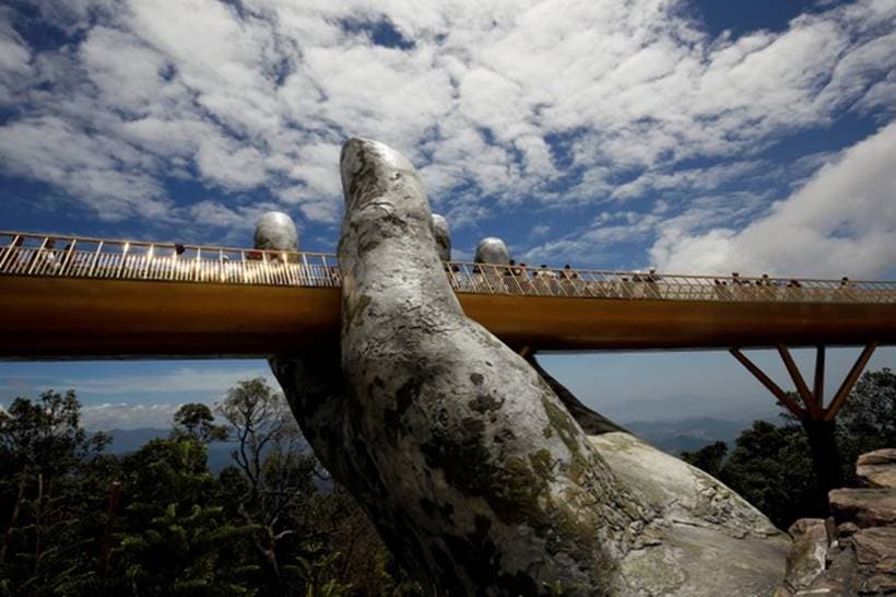 In the hands of the gods: Vietnam's Golden Bridge has giant support