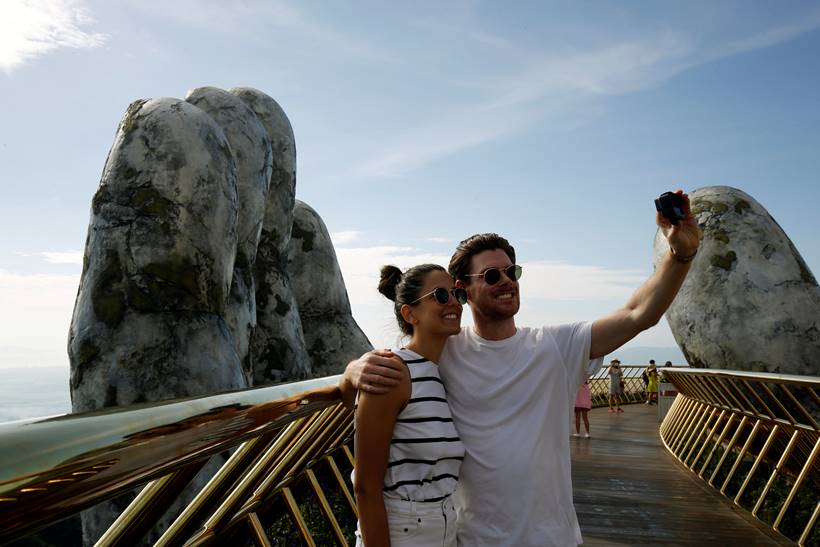 In the hands of the gods: Vietnam's Golden Bridge has giant support