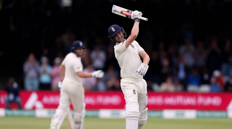 England's Chris Woakes celebrates reaching a century against India at Lord's in second Test