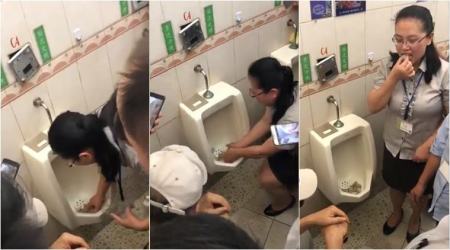 WATCH: Yikes! Chinese woman eats riceball out of urinal to prove it’s clean