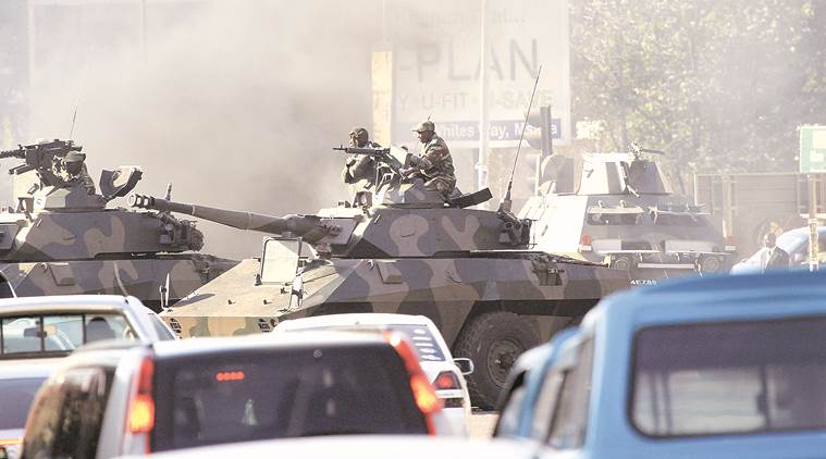 Tanks appeared on Harare’s streets after incomplete results showing a big victory for Zanu-PF triggered violent protests Wednesday. AP