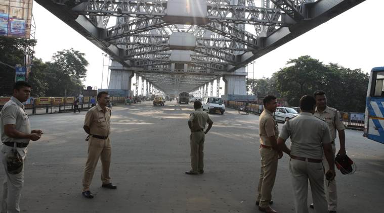A strong contingent of police was deployed on the Howrah Bridge and in several other areas. (Express photo/Partha Paul)