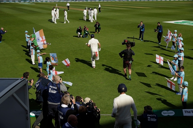 England's Alastair Cook, center, runs out in his bat last Testwed battle during a fifth match series between England and India at the Oval cricket ground in London 