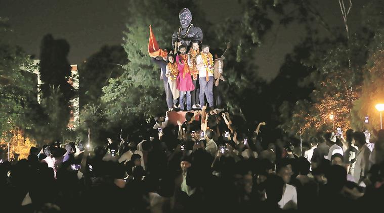 ABVP’s winning candidates at the Vivekananda statue in Arts Faculty, Thursday. (Express photo/Tashi Tobgyal)