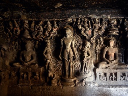 Seated meditating figures of Tirthankaras flank Bahubali performing penance in the center. (Source: Sahapedia)