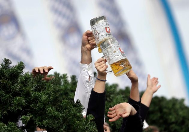 Beer flows as Germany's Oktoberfest opens in Munich