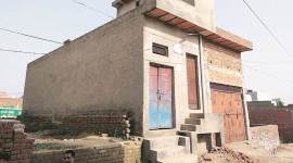 The factory is a one-storey building in the middle of an informal colony in Loni’s Daulat Nagar. (Express photo)